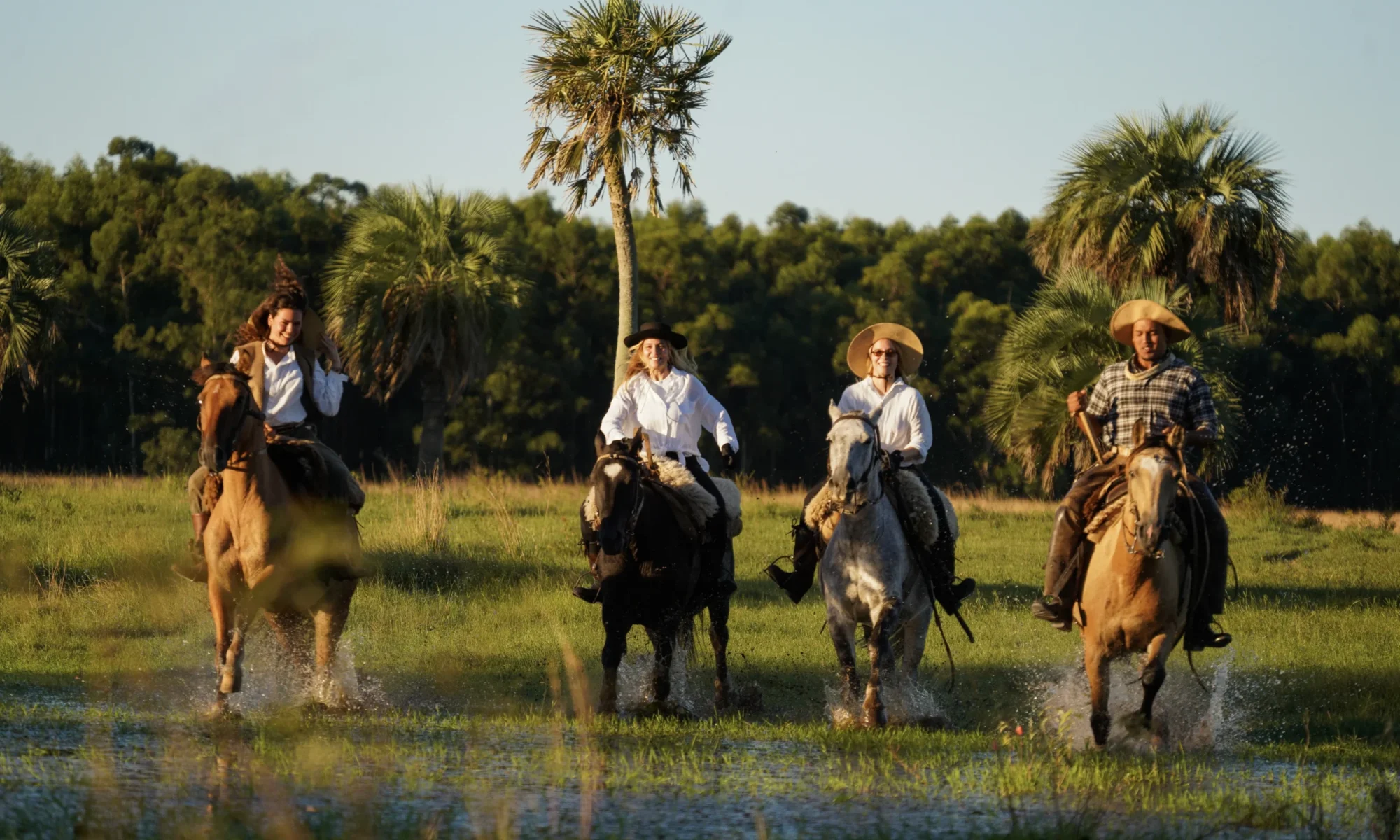 estancia don joaquin corrientes argentina horse riding landscape authentic family ranch canter in the water