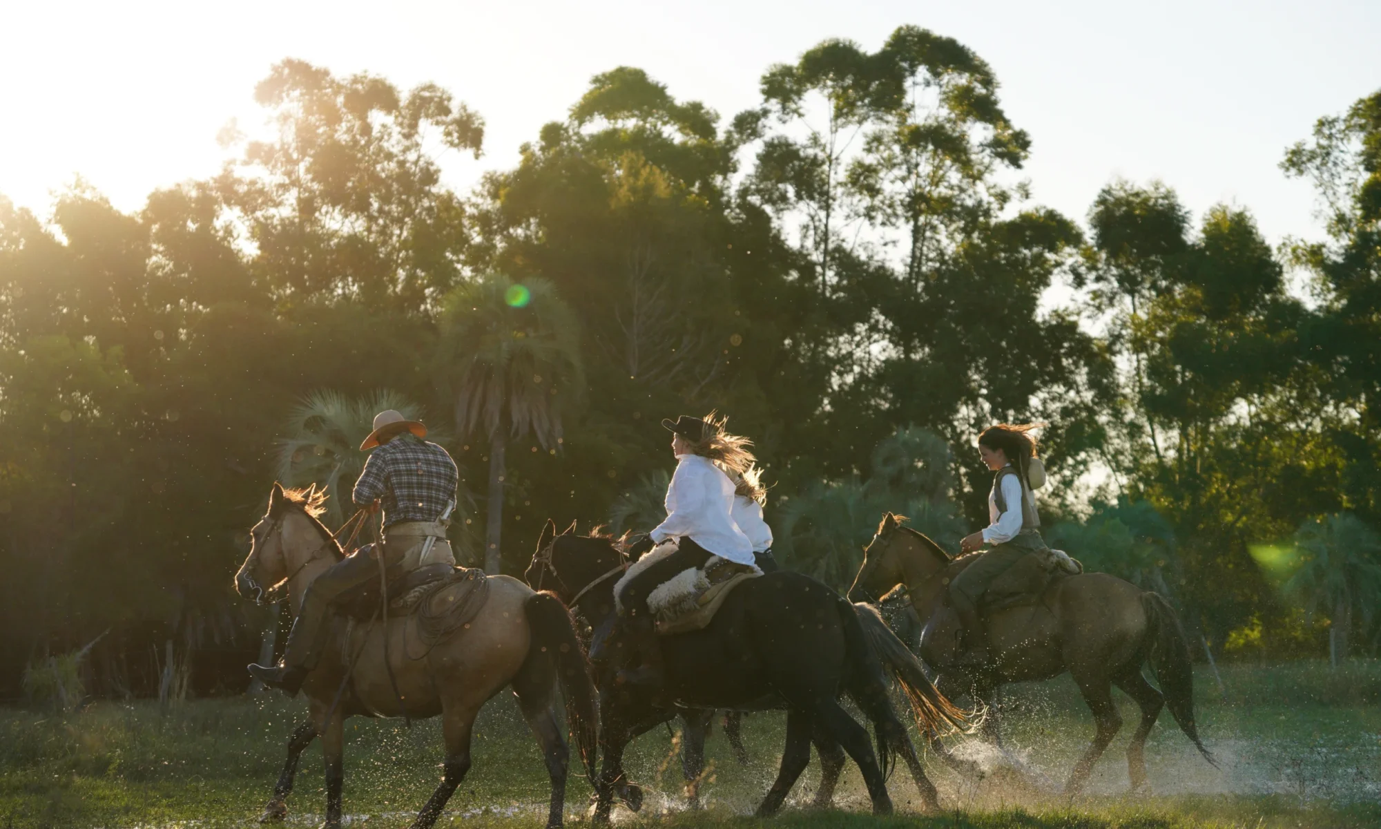 estancia don joaquin corrientes argentina horse riding landscape authentic family ranch canter in the water